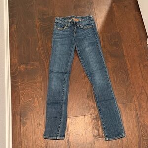 Tory Burch super skinny Dark Blue Jeans with Studded Pocket Detail